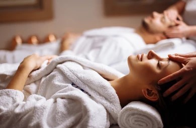young couple receiving head massage 260nw 794084224